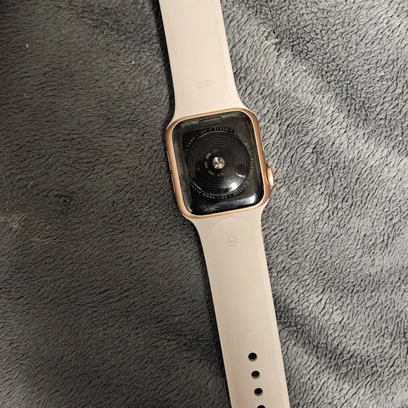 APPLE WATCH SE AND CHARGER (has a small scratch/crack) - Picture 2 of 4